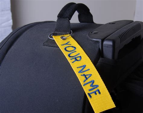 embroidered luggage labels.